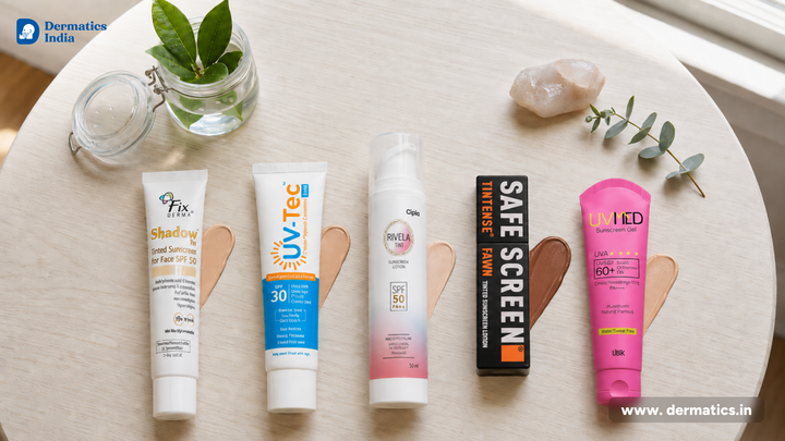 Five best tinted sunscreens for Indian skin with swatches arranged on a table, Dermatics India